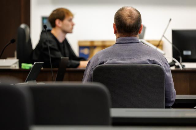 07 July 2026, Bavaria, Nuremberg: A defendant sits in the courtroom of the Criminal Justice Center at the Nuremberg-Fuerth Regional Court at the start of his trial. The man, from Middle Franconia, is accused of having instructed the child's mother to allow the abuse of the child-who was between eight and eleven years old-over a period of three years. Photo: Daniel Karmann/dpa