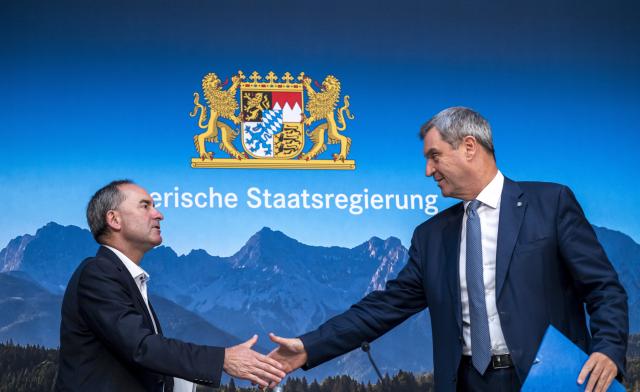 07 July 2026, Bavaria, Munich: Bavarian Minister of Economic Affairs Hubert Aiwanger (L) and Minister President of Bavaria Markus Soeder attend a press conference following the Bavarian cabinet meeting. Photo: Peter Kneffel/dpa