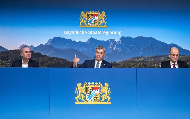 07 July 2026, Bavaria, Munich: (L-R) Bavarian Minister of Economic Affairs Hubert Aiwanger, Minister President of Bavaria Markus Soeder and Minister of State for Finance and Home Affairs Albert Fueracker attend a press conference following the Bavarian cabinet meeting. Photo: Peter Kneffel/dpa