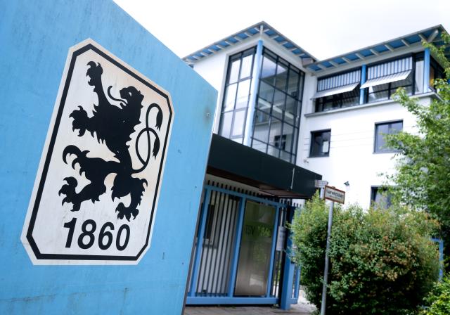 FILED - 05 June 2026, Bavaria, Munich: FILE PHOTO - The TSV 1860 Munich logo can be seen on the training ground in front of the club headquarters in Munich. Photo: Sven Hoppe/dpa