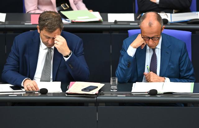 09 July 2026, Berlin: Lars Klingbeil (L), German Minister of Finance, and German Chancellor Friedrich Merz attend the plenary session of the German Parliament (Bundestag). Photo: Elisa Schu/dpa