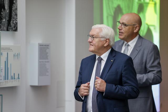 09 July 2026, North Rhine-Westphalia, Bonn: German President Frank-Walter Steinmeier and Harald Biermann, president of the Haus der Geschichte Foundation, walk together through the permanent exhibition "You Are Part of History." Photo: Thomas Banneyer/dpa