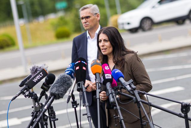 09 July 2026, Lower Saxony, Wolfsburg: Chair of the General and Group Works Council of Volkswagen AG Daniela Cavallo (R) and IG Metall regional director for Lower Saxony and Saxony-Anhalt and chief negotiator for the VW in-house collective bargaining agreement Thorsten Groeger speak to media representatives at the Sandkamp gate of the VW plant following the IG Metall rally. On the day of the Volkswagen AG Supervisory Board meeting in Wolfsburg, IG Metall is organizing information and protest events nationwide at numerous company locations. Photo: Moritz Frankenberg/dpa