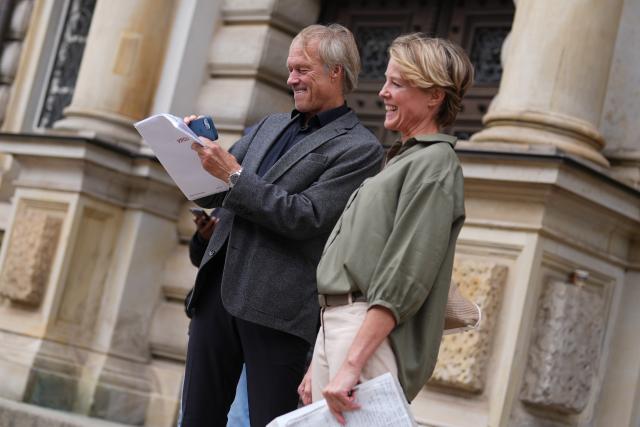 09 July 2026, Hamburg: Christina Block and Gerhard Delling leave the Hamburg Regional Court after a hearing in the trial over the alleged abduction of Block's children. According to the indictment, masked men brought two of Block's children from Denmark to Germany on New Year's Eve 2023-24. Photo: Marcus Brandt/dpa