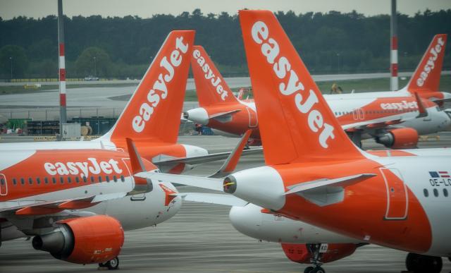 FILED - 29 April 2020, Brandenburg, Berlin: Easy Jet aircraft are parked on the apron of the new Berlin-Brandenburg Willy-Brandt Airport. Photo: Michael Kappeler/dpa