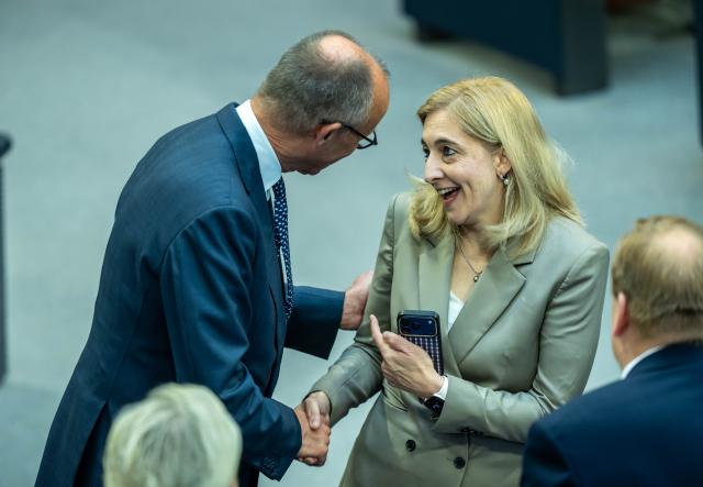 10 July 2026, Berlin: Nina Warken (CDU), German Minister of Health, speaks with German Chancellor Friedrich Merz (CDU) in the Bundestag on the last day of the session before the summer recess, when, among other items, a vote on the black-red coalition's health care austerity package is on the agenda. Photo: Michael Kappeler/dpa