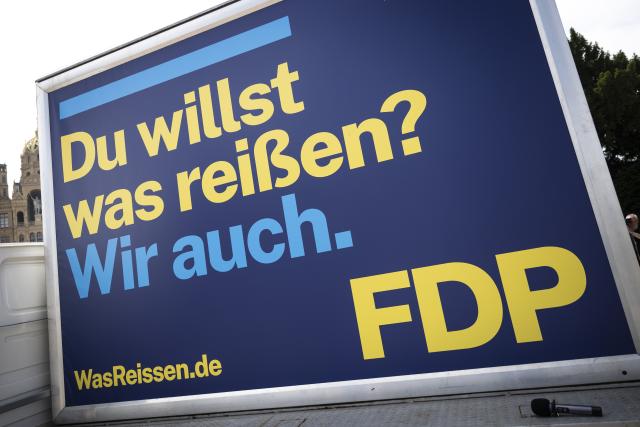 10 July 2026, Mecklenburg-Vorpommern, Schwerin: "You want to make a difference? So do we," reads an FDP campaign poster for the state election. The party unveiled its campaign for the state election on September 20 in Schwerin. Photo: Philip Dulian/dpa