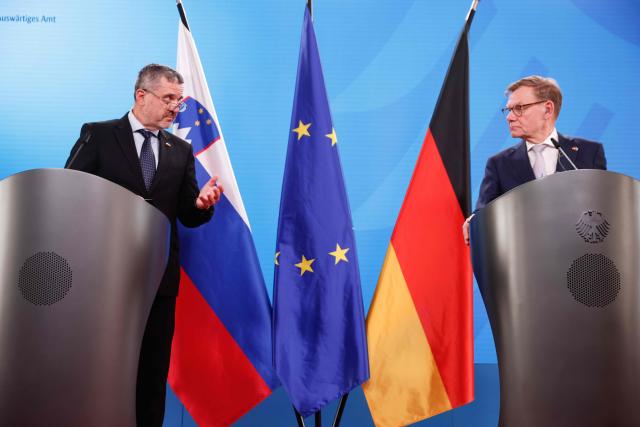 10 July 2026, Berlin: German Minister of Foreign Affairs Johann Wadephul (R) and his Slovenian counterpart Tone Kajzer speak during a press conference following their meeting. Photo: Carsten Koall/dpa