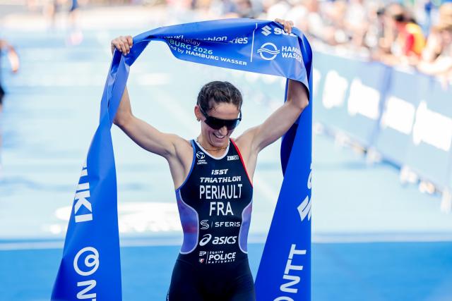 11 July 2026, Hamburg: French triathlete Leonie Periault wins the women's sprint race at the ITU World Triathlon Series/World Championship, comprising a 750-metre swim, a 20-kilometre bike ride and a five-kilometre run. Photo: Philipp Szyza/dpa