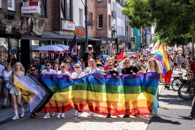 11 July 2026, North Rhine-Westphalia, Wesel: People take part in a demonstration marking the Christopher Street Day (CSD) in Wesel. Photo: Arnulf Stoffel/dpa