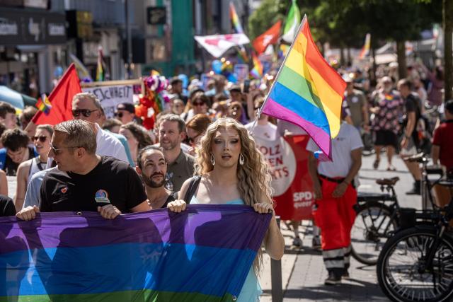 11 July 2026, North Rhine-Westphalia, Wesel: People take part in a demonstration marking the Christopher Street Day (CSD) in Wesel. Photo: Arnulf Stoffel/dpa