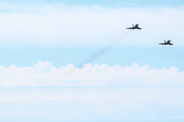 13 July 2026, Lower Saxony, Wittmund: Two Airbus Defence and Space Eurofighter Typhoons fly over Tactical Air Force Wing 71 "Richthofen" at Wittmund Air Base in Wittmund, Germany. Photo: Lars Penning/dpa