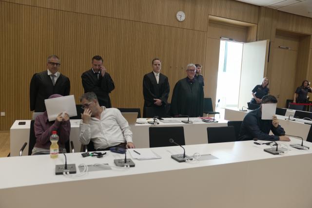 13 July 2026, Bavaria, Munich: (L-R) The defendants are seated in the courtroom during the trial of an Iraqi couple convicted of enslaving two Yazidi girls and of membership in the terrorist organization Islamic State (IS) at the Higher Regional Court in Munich. Photo: Ehsan Monajati/dpa
