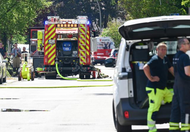 13 July 2026, Baden-Wuerttemberg, Remseck: Firefighters work on the scene at a substation where a fire broke out. Due to a deflagration at the Aldingen substation, residents in Remseck, Pattonville and parts of Fellbach are without power. Photo: Bernd Weißbrod/dpa