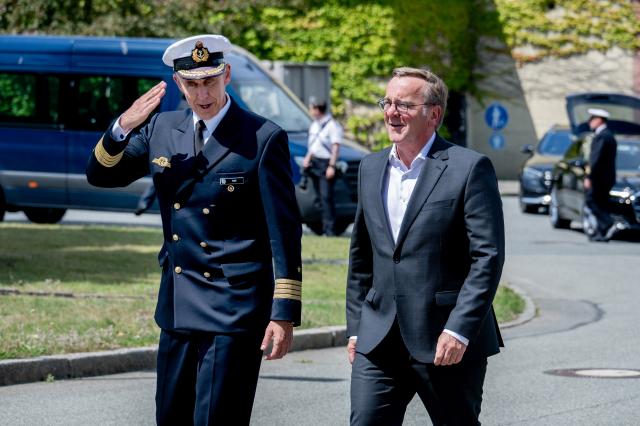 13 July 2026, Bremen, Bremerhaven: Captain and Commander of the Naval Operations School (MOS) Andreas Seidl (L) welcomes German Minister of Defense Boris Pistorius upon his arrival to visit the Naval Operations School (MOS). Photo: Hauke-Christian Dittrich/dpa