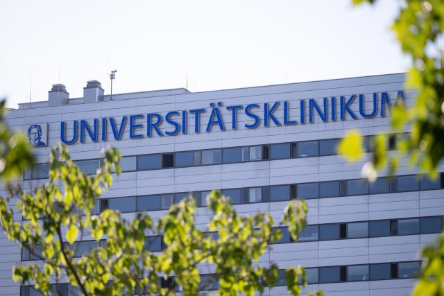 13 July 2026, Hesse, Frankfurt/M.: The words "Universitätsklinikum" are displayed on the hospital's main entrance. A US citizen infected with the Ebola virus has been flown to Germany for treatment. Photo: Florian Wiegand/dpa