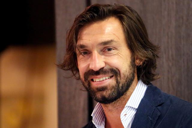 FILED - 22 October 2018, Duisburg: FILE PHOTO - Italian former footballer Andrea Pirlo smiles during the presentation of his wine brand at a hotel in Duisburg. Photo: Roland Weihrauch/dpa