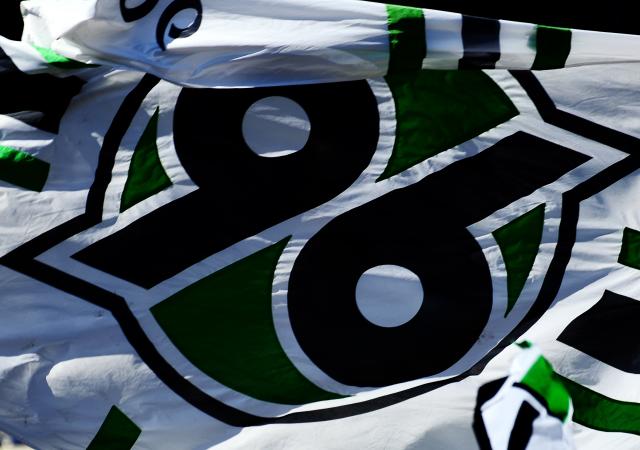 FILED - 13 March 2022, Lower Saxony, Hanover: FILE PHOTO - The Hannover 96 logo is visible on a flag during the German Bundesliga soccer match between Hannover 96 and 1. FC Nurnberg. The club is calling for donations for its former striker, Kreso Kovacec. Photo: Swen Pförtner/dpa