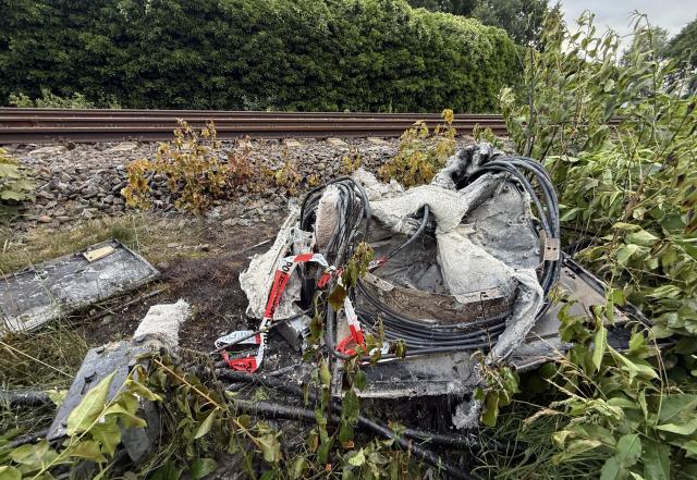 14 July 2026, Lower Saxony, Neu Wulmstorf: The charred remains of a railway distribution box are seen after a suspected arson attack in Neu Wulmstorf. Train services between Hamburg and Cuxhaven were suspended after a fire damaged the installation overnight. Photo: Sebastian Peters/NEWS5/dpa