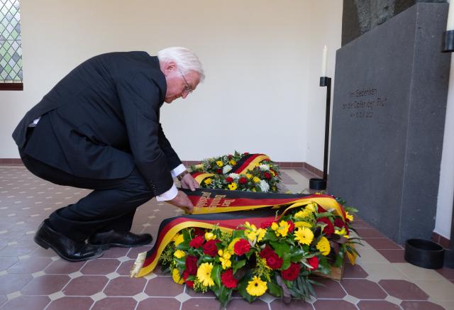 14 July 2026, Rhineland-Palatinate, Ahrweiler: German President Frank-Walter Steinmeier lays a wreath for the victims of the flood disaster in the chapel at the cemetery in Ahrweiler. Photo: Boris Roessler/dpa-Pool/dpa