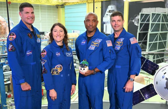14 July 2026, Bremen: The astronauts of the Artemis II mission Jeremy Hansen, mission specialist of the Canadian Space Agency (CSA), Christina Koch, mission specialist, Victor Glover, pilot, 
and Reid Wiseman, commander, stand for interviews at an event about the Artemis II mission hosted by NASA and Airbus. Photo: Carmen Jaspersen/dpa