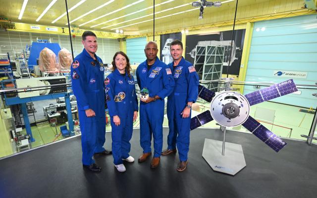 14 July 2026, Bremen: The astronauts of the Artemis II mission Jeremy Hansen, mission specialist of the Canadian Space Agency (CSA), Christina Koch, mission specialist, Victor Glover, pilot, 
and Reid Wiseman, commander, stand for interviews at an event about the Artemis II mission hosted by NASA and Airbus. Photo: Carmen Jaspersen/dpa