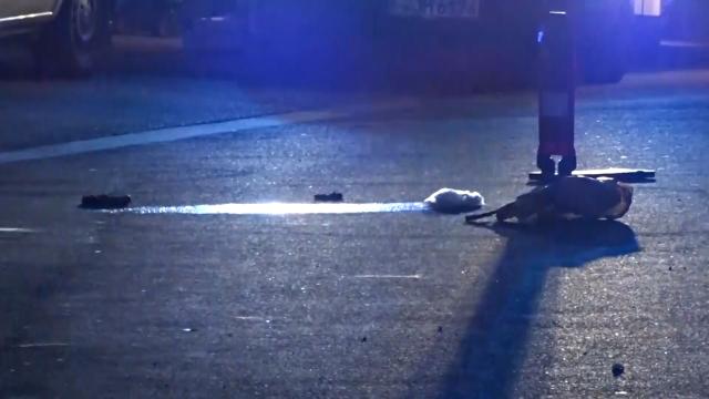 15 July 2026, Hesse, Kelkheim: Evidence remains at the scene of a fatal attack in Kelkheim. Police said a man fatally attacked his wife with a bladed weapon on a public street before being overpowered by witnesses and arrested. Photo: Mike Seeboth/dpa
