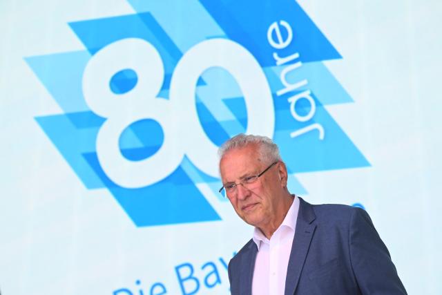 18 July 2026, Bavaria, Munich: Interior Minister Joachim Herrmann (both CSU) stands on stage at the official opening ceremony as part of the "80 Years of the Bavarian Police" celebration. Photo: Felix Hörhager/dpa