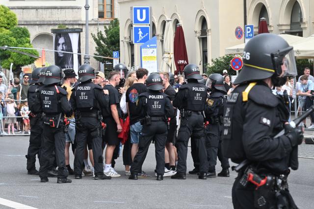18 July 2026, Bavaria, Munich: A special demonstrations unit demonstrates its capabilities during a drill as part of the "80 Years of the Bavarian Police" celebrations on Ludwigstraße in Munich, Germany. Photo: Felix Hörhager/dpa