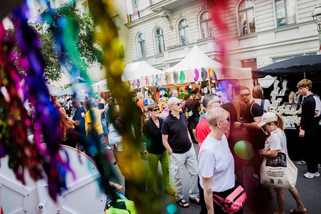18 July 2026, Berlin: People attend the Lesbian and Gay City Festival in Berlin's Rainbow Neighbourhood around Nollendorfplatz. Photo: Christoph Soeder/dpa