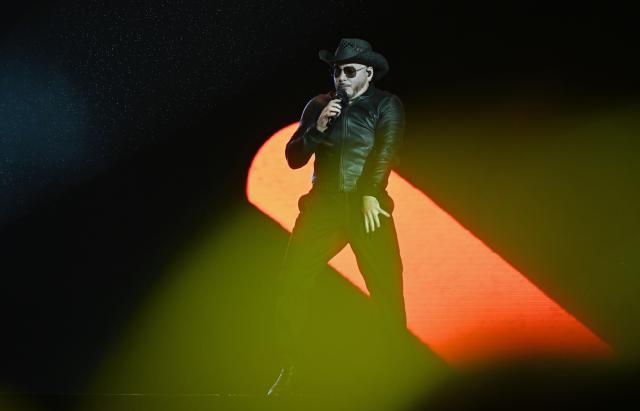 18 July 2026, Berlin: American rapper Pitbull performs on stage during the first day of the Lollapalooza Festival at the Berlin Olympic Park. Photo: Elisa Schu/dpa