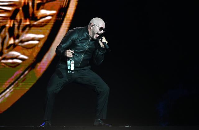 18 July 2026, Berlin: American rapper Pitbull performs on stage during the first day of the Lollapalooza Festival at the Berlin Olympic Park. Photo: Elisa Schu/dpa