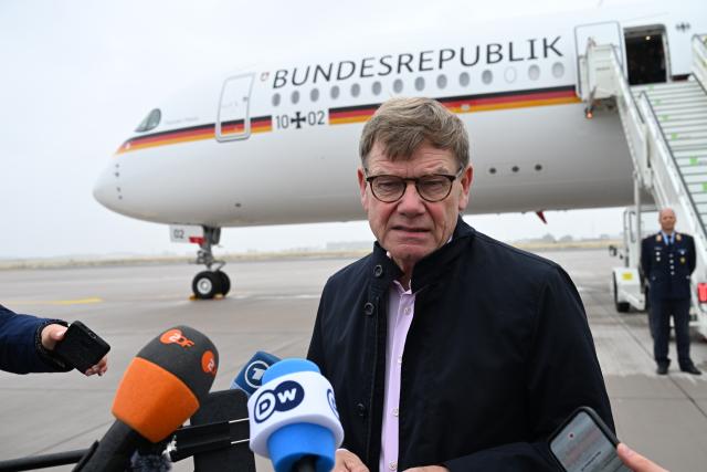 20 July 2026, Brandenburg, Schönefeld: German Foreign Minister Johann Wadephul talks to the press as he arrives at the military section of Berlin-Brandenburg Airport (BER)for his flight to Mauritania. Photo: Soeren Stache/dpa
