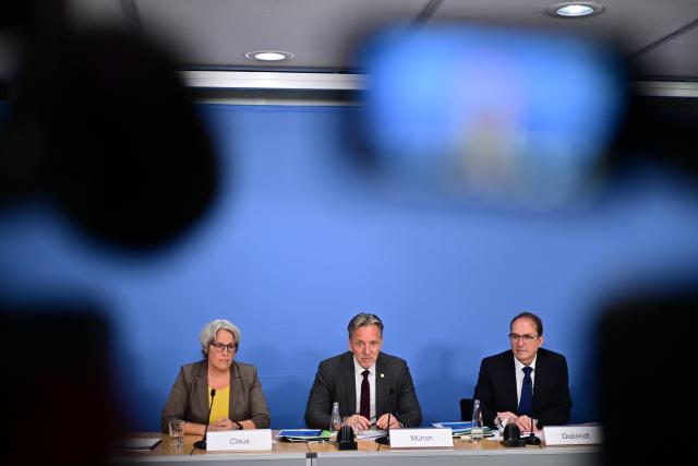 21 July 2026, Berlin: Kerstin Claus (L-R), Federal Commissioner for the Protection of Children and Adolescents from Sexual Abuse (UBSKM), Holger Münch, President of the Federal Criminal Police Office (BKA), and Alexander Dobrindt (CSU), Federal Minister of the Interior, are attending the presentation of the 2025 Federal Report on Sexual Offenses Against Children and Adolescents. Photo: Sebastian Gollnow/dpa