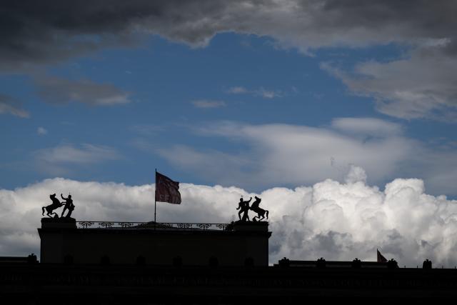 21 July 2026, Berlin: The figures on the Altes Museum on Museum Island seen in front of the clouds. Photo: Sebastian Gollnow/dpa