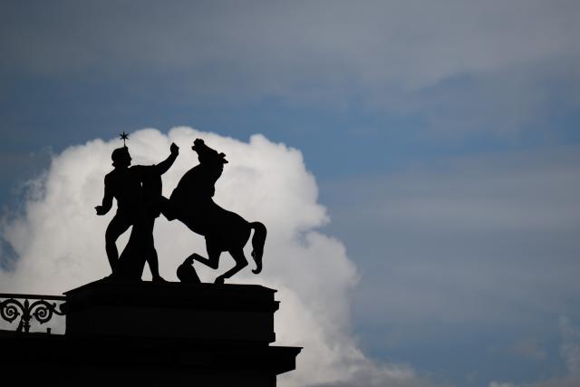 21 July 2026, Berlin: The figures on the Altes Museum on Museum Island seen in front of the clouds. Photo: Sebastian Gollnow/dpa