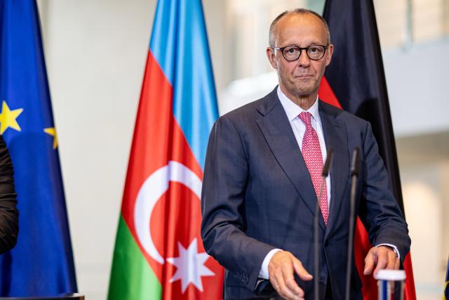 21 July 2026, Berlin: German Chancellor Friedrich Merz speaks during a press conference with Ilham Aliyev, President of Azerbaijan, following their meeting at the Federal Chancellery. Photo: Fabian Sommer/dpa