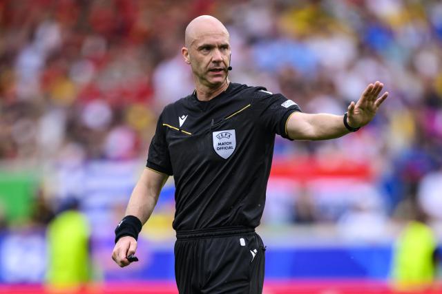 FILED - 26 June 2024, Baden-Wuerttemberg, Stuttgart: FILE PHOTO - English Referee Anthony Taylor gestures during the 2024 UEFA EURO Group E soccer match between Ukraine and Belgium at Stuttgart Arena. Photo: Tom Weller/dpa
