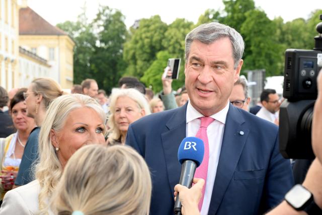 21 July 2026, Bavaria, Oberschleissheim: Bavarian Minister-President Markus Soeder speaks to the press during the Bavarian State Parliament's summer reception at the New Palace in Schleissheim. Photo: Felix Hörhager/dpa