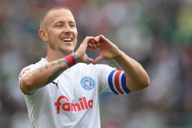 FILED - 19 May 2024, Lower Saxony, Hanover: FILE PHOTO - Kiel's Lewis Holtby celebrates scoring his side's first goal during the 2nd Bundesliga 2 soccer match between Hannover 96 and Holstein Kiel at Heinz von Heiden-Arena. Photo: Swen Pförtner/dpa
