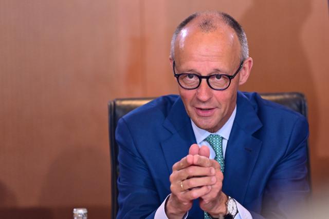 22 July 2026, Berlin: German Chancellor Friedrich Merz takes his seat before the Federal Cabinet meeting. Photo: Sebastian Gollnow/dpa