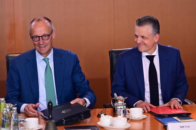 22 July 2026, Berlin: German Chancellor Friedrich Merz L and Thorsten Frei, Head of the Chancellery and German Minister for Special Tasks, sit side by side before the Cabinet meeting. Photo: Sebastian Gollnow/dpa