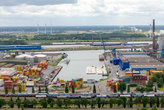 22 July 2026, Bremen: An aerial view shows the Port of Bremen. The union and employers are negotiating the dockworkers' wages. Photo: Sina Schuldt/dpa