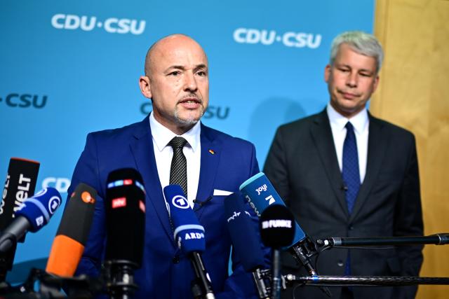 22 July 2026, Berlin: Alexander Hoffmann (L), Interim chair of the Christian Democratic Union of Germany (CDU) and the Christian Social Union in Bavaria (CSU) parliamentary group in the Bundestag, and Steffen Bilger, first parliamentary secretary of the CDU/CSU parliamentary group in the Bundestag, speak during a press briefing held by the CDU/CSU parliamentary group in the Bundestag. Photo: Sebastian Gollnow/dpa
