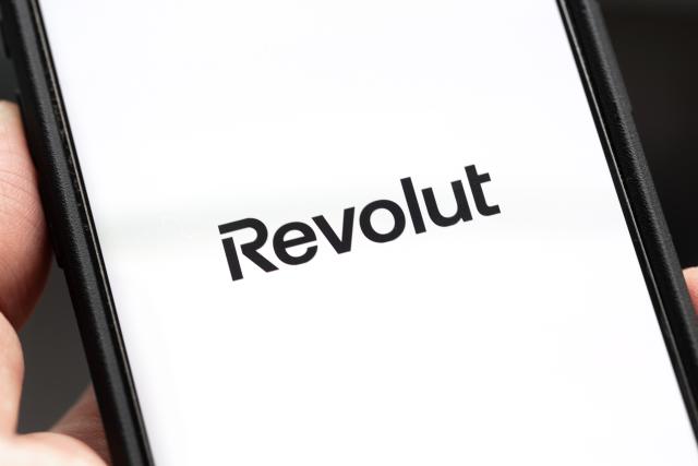 FILED - 08 May 2026, Berlin: FILE PHOTO - The logo of the financial app Revolut can be seen on the display of a smartphone. Photo: Fernando Gutierrez-Juarez/dpa