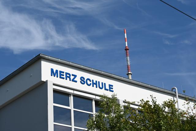 22 July 2026, Baden-Wuerttemberg, Stuttgart: "Merz School" is written on the side of the school building. Photo: Jennifer Kramer/dpa