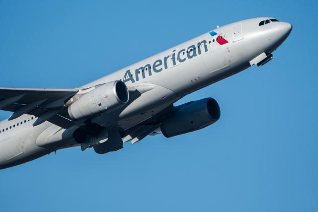 FILED - 17 November 2018, Hesse, Frankfurt Main: FILE PHOTO - An American Airlines passenger plane takes off at Frankfurt am Main Airport. Photo: Silas Stein/dpa