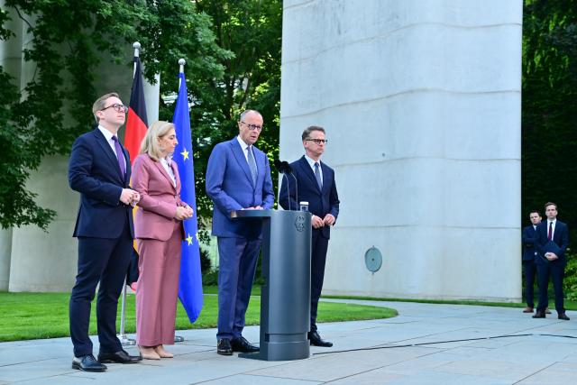 24 July 2026, Berlin: German Chancellor Friedrich Merz (2nd R), former Health Minister Nina Warken, former Christian Democratic Union (CDU) Secretary-General Carsten Linnemann (R), and former Parliamentary State Secretary at the Ministry of Digital Affairs, Philipp Amthor (L), hold a press conference at the Chancellery in Berlin regarding personnel changes in the government and the CDU. Photo: Sebastian Gollnow/dpa