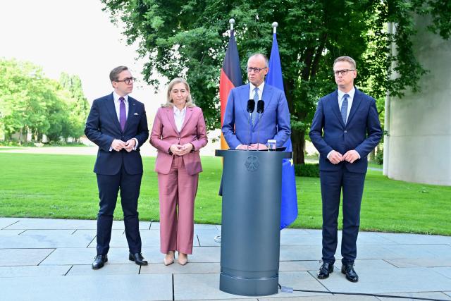 24 July 2026, Berlin: German Chancellor Friedrich Merz (2nd R), former Health Minister Nina Warken, former Christian Democratic Union (CDU) Secretary-General Carsten Linnemann (R), and former Parliamentary State Secretary at the Ministry of Digital Affairs, Philipp Amthor (L), hold a press conference at the Chancellery in Berlin regarding personnel changes in the government and the CDU. Photo: Sebastian Gollnow/dpa