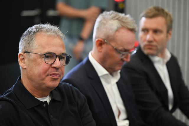 24 July 2026, Hesse, Frankfurt/Main: (L-R) Andreas Rettig, Alexander Wehrle, and Holger Blask wait for the press conference to begin ahead of the introduction of the new national team head coach. Photo: Florian Wiegand/dpa